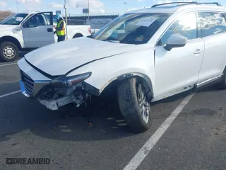 2018 Mazda CX-9 Grand Touring with VIN JM3TCBDY6J0200843, listed as a IAAI auction lot 40971233 with 94,770 mi miles. Bid and sale history available at carsss.com. Image 6.