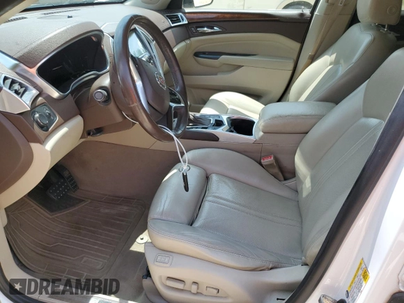 2014 Cadillac SRX Luxury Collection z VIN 3GYFNBE30ES685072, wystawiony jako Copart lot #58122705 z przebiegiem 128 013 mil mil oraz Szkoda całkowita • Salvage title. Historia ofert i sprzedaży dostępna na DreamBid. Obrazek 7.