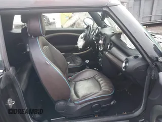 2013 MINI Convertible S with VIN WMWZP3C54DT297304, listed as a IAAI auction lot 41377572 with 101,991 mi miles and . Bid and sale history available at DreamBid. Image 5.
