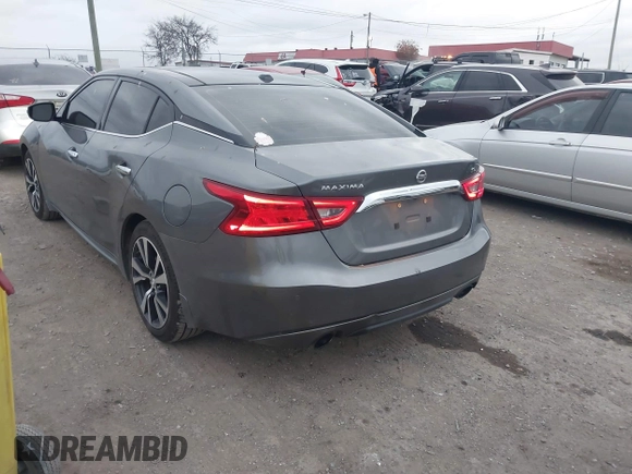 2016 Nissan Maxima SL with VIN 1N4AA6AP0GC424793, listed as a IAAI auction lot 40922109 with 135,974 mi miles and . Bid and sale history available at DreamBid. Image 3.