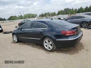 2014 Volkswagen CC Sport z VIN WVWBN7AN5EE501201, wystawiony jako Copart lot #56541045 z przebiegiem 92 765 mil mil oraz Szkoda całkowita • Salvage title. Historia ofert i sprzedaży dostępna na DreamBid. Obrazek 2.
