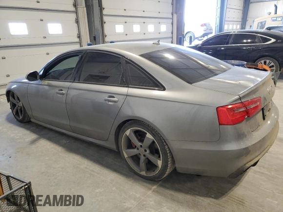 2015 Audi S6 Prestige with VIN WAUF2AFC7FN005779, listed as a Copart auction lot 86597504 with 103,980 mi miles and Salvage Title. Bid and sale history available at carsss.com. Image 2.