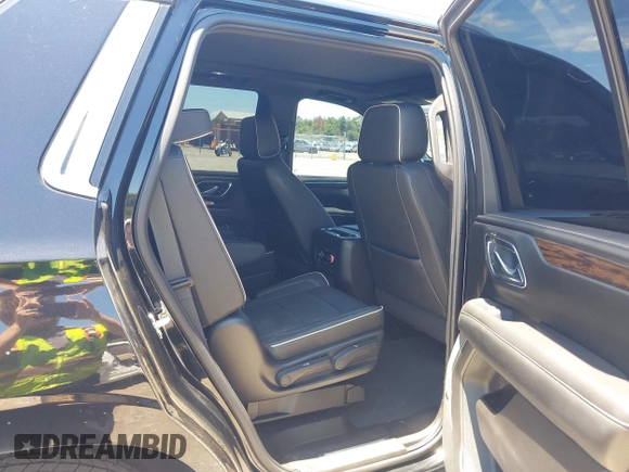 2021 Chevrolet Tahoe Premier with VIN 1GNSKSKDXMR195984, listed as a IAAI auction lot 42528305 with 89,925 mi miles and . Bid and sale history available at DreamBid. Image 8.