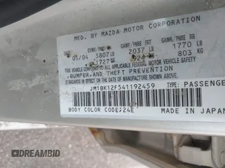 2004 Mazda 3 i with VIN JM1BK12F541192459, listed as a IAAI auction lot 41206660 with Not Provided miles and . Bid and sale history available at DreamBid. Image 9.
