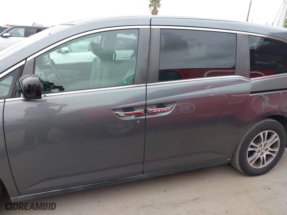 2011 Honda Odyssey EX-L with VIN 5FNRL5H66BB015305, listed as a IAAI auction lot 42065872 with 190,580 mi miles. Bid and sale history available at carsss.com. Image 14.