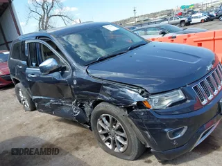 2015 Jeep Grand Cherokee Overland with VIN 1C4RJFCG6FC831641, listed as a IAAI auction lot 41877680 with 143,568 mi miles. Bid and sale history available at carsss.com. Image 13.