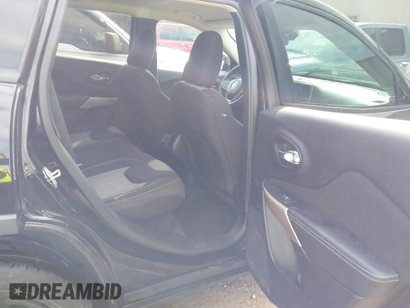 2017 Jeep Cherokee Altitude with VIN 1C4PJLAB7HW660624, listed as a IAAI auction lot 41488683 with 106,963 mi miles and . Bid and sale history available at DreamBid. Image 8.