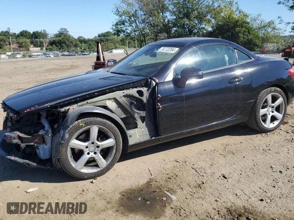 2015 Mercedes-Benz SLK-Class SLK 250 with VIN WDDPK4HA9FF096428, listed as a Copart auction lot 74772284 with 74,938 mi miles and Salvage Title. Bid and sale history available at carsss.com. Image 1.