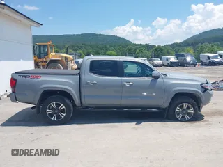2019 Toyota Tacoma SR with VIN 3TMCZ5AN1KM274625, listed as a IAAI auction lot 42660593 with 163,460 mi miles and . Bid and sale history available at DreamBid. Image 13.