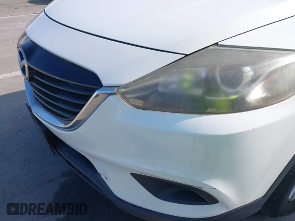 2015 Mazda CX-9 Sport with VIN JM3TB2BAXF0453244, listed as a IAAI auction lot 41905847 with 128,764 mi miles and . Bid and sale history available at carsss.com. Image 6.