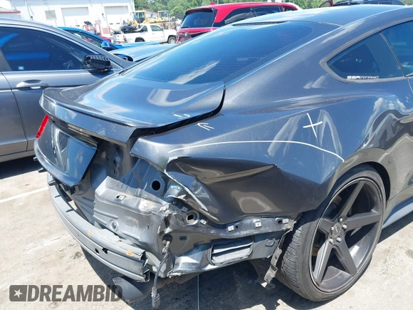 2015 Ford Mustang EcoBoost z VIN 1FA6P8TH5F5351476, wystawiony jako IAAI lot #42157688 z przebiegiem 134 131 mil mil oraz . Historia ofert i sprzedaży dostępna na DreamBid. Obrazek 19.