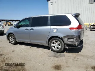 2012 Toyota Sienna with VIN 5TDZK3DC8CS246285, listed as a Copart auction lot 61676185 with 114,700 mi miles and Salvage title. Bid and sale history available at DreamBid. Image 2.