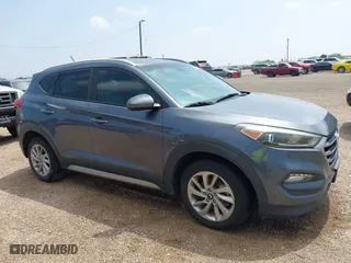 2017 Hyundai Tucson SE Plus with VIN KM8J33A42HU375273, listed as a IAAI auction lot 41900474 with 124,658 mi miles. Bid and sale history available at carsss.com. Image 13.