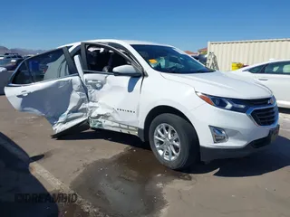 2021 Chevrolet Equinox LT z VIN 3GNAXUEV6ML355881, wystawiony jako IAAI lot #42117829 z przebiegiem 50 116 mil mil oraz . Historia ofert i sprzedaży dostępna na DreamBid. Obrazek 1.
