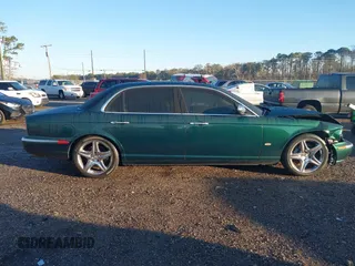 2007 Jaguar XJ VDP with VIN SAJWA82C37TH14330, listed as a IAAI auction lot 41316658 with 59,745 mi miles. Bid and sale history available at carsss.com. Image 13.