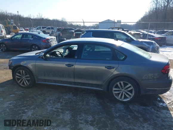2019 Volkswagen Passat 2.0T Wolfsburg Edition with VIN 1VWLA7A37KC012589, listed as a IAAI auction lot 41394161 with 97,652 mi miles. Bid and sale history available at carsss.com. Image 14.