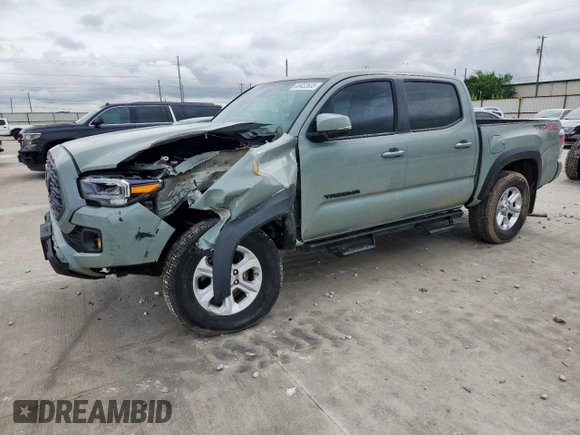 2023 Toyota Tacoma SR with VIN 3TMCZ5AN2PM580515, listed as a Copart auction lot 60422635 with 65,846 mi miles and Salvage title. Bid and sale history available at DreamBid. Image 1.