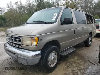 2001 Ford Econoline Passenger XL z VIN 1FBSS31LX1HA23564, wystawiony jako Copart lot #77703044 z przebiegiem 276 538 mil mil oraz Szkoda całkowita • Salvage title. Historia ofert i sprzedaży dostępna na DreamBid. Obrazek 1.