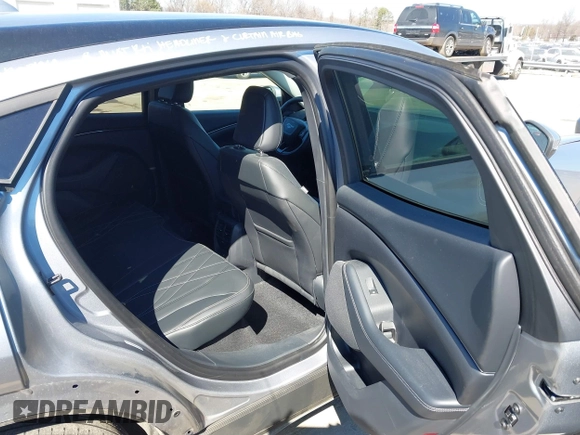 2021 Ford Mustang Mach-E Select z VIN 3FMTK1RM3MMA07686, wystawiony jako IAAI lot #41702088 z przebiegiem 26 158 mil mil oraz . Historia ofert i sprzedaży dostępna na DreamBid. Obrazek 8.