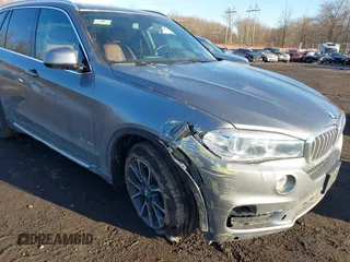 2017 BMW X5 xDrive35i z VIN 5UXKR0C51H0U53611, wystawiony jako IAAI lot #41574622 z przebiegiem 76 825 mil mil oraz . Historia ofert i sprzedaży dostępna na DreamBid. Obrazek 6.