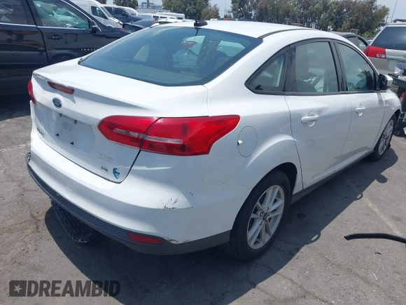 2017 Ford Focus SE with VIN 1FADP3F21HL217838, listed as a IAAI auction lot 42560331 with 154,406 mi miles and . Bid and sale history available at DreamBid. Image 4.