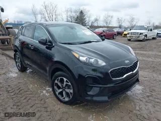 2021 Kia Sportage LX with VIN KNDPM3AC5M7857490, listed as a IAAI auction lot 41953861 with 77,967 mi miles. Bid and sale history available at carsss.com. Image 1.
