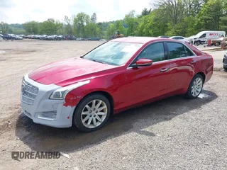 2014 Cadillac CTS AWD z VIN 1G6AW5SX3E0129127, wystawiony jako IAAI lot #42193399 z przebiegiem 108 037 mil mil oraz . Historia ofert i sprzedaży dostępna na DreamBid. Obrazek 2.