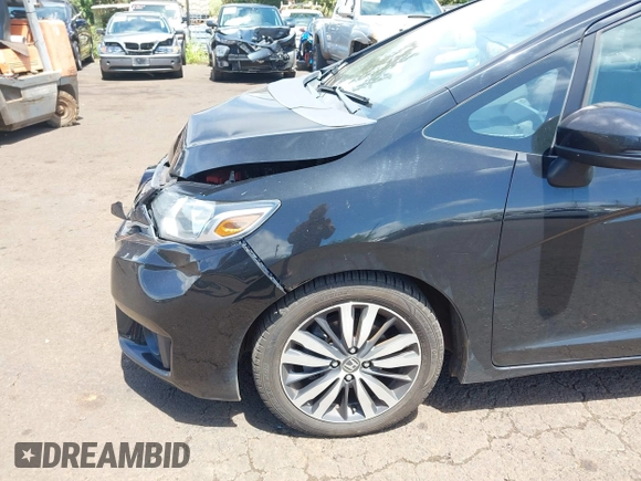 2015 Honda Fit EX-L with VIN 3HGGK5H89FM706018, listed as a IAAI auction lot 42417637 with 36,556 mi miles and . Bid and sale history available at DreamBid. Image 17.