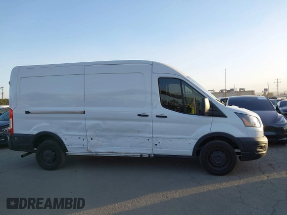 2023 Ford Transit Cargo with VIN 1FTBR1C8XPKC07287, listed as a IAAI auction lot 41247582 with 12,776 mi miles and . Bid and sale history available at DreamBid. Image 13.