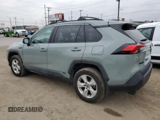 2021 Toyota RAV4 Hybrid XLE with VIN 2T3RWRFV8MW116853, listed as a Copart auction lot 65974935 with 89,319 mi miles and Salvage title. Bid and sale history available at DreamBid. Image 2.