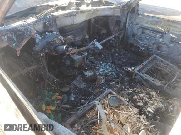1994 GMC Suburban z VIN 1GKEC16K3RJ769051, wystawiony jako Copart lot #74576864 z przebiegiem Nie podano mil oraz Nie do naprawy • Non repairable. Historia ofert i sprzedaży dostępna na DreamBid. Obrazek 8.