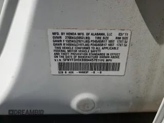2011 Honda Pilot Touring z VIN 5FNYF3H9XBB044579, wystawiony jako Copart lot #50303125 z przebiegiem 227 482 mil mil oraz Szkoda całkowita • Salvage title. Historia ofert i sprzedaży dostępna na DreamBid. Obrazek 15.