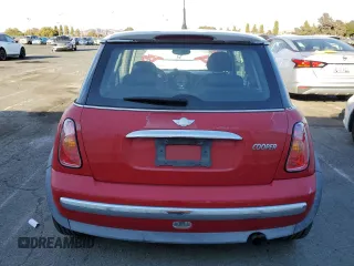 2004 MINI Hardtop with VIN WMWRC33474TJ53569, listed as a Copart auction lot 72429454 with 154,713 mi miles and Salvage Title. Bid and sale history available at DreamBid. Image 6.