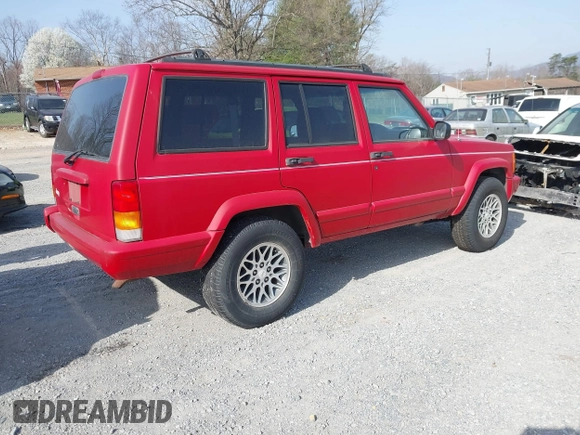 1997 Jeep Cherokee Country with VIN 1J4FJ78S9VL591872, listed as a IAAI auction lot 41830794 with 191,074 mi miles. Bid and sale history available at carsss.com. Image 4.