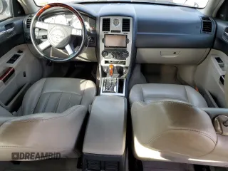 2006 Chrysler 300 C with VIN 2C3KK63H46H296625, listed as a Copart auction lot 70220974 with 104,811 mi miles and Salvage Title. Bid and sale history available at carsss.com. Image 8.