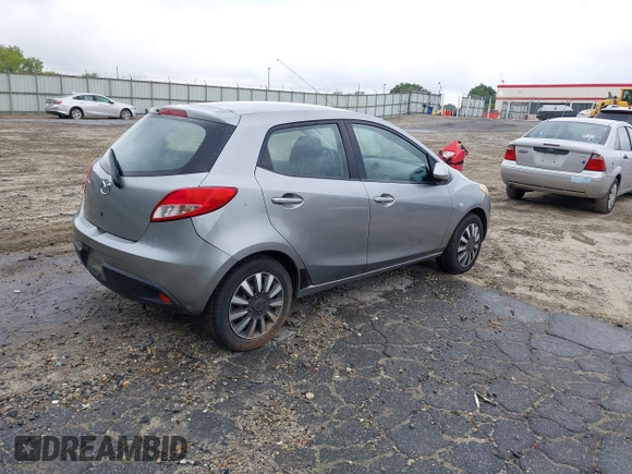 2013 Mazda 2 Sport with VIN JM1DE1KY9D0170519, listed as a IAAI auction lot 42212054 with 182,643 mi miles and . Bid and sale history available at DreamBid. Image 4.