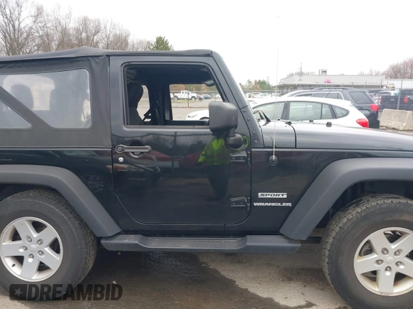 2014 Jeep Wrangler Sport with VIN 1C4AJWAG9EL312856, listed as a IAAI auction lot 42022870 with 98,323 mi miles and . Bid and sale history available at DreamBid. Image 13.