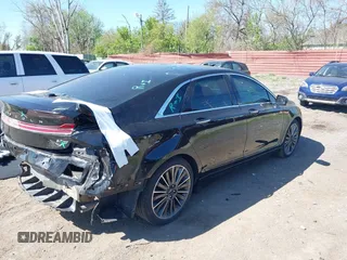 2016 Lincoln MKZ с VIN 3LN6L2JK3GR604600, выставлен на аукционе IAAI как лот 42155353 с пробегом 56 574 миль миль и . История ставок и продаж доступна на DreamBid. Изображение 4.