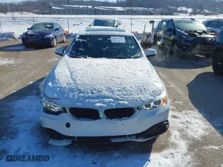 2016 BMW 4 Series 428i with VIN WBA4A9C50GG696366, listed as a IAAI auction lot 41615789 with 103,763 mi miles. Bid and sale history available at carsss.com. Image 12.