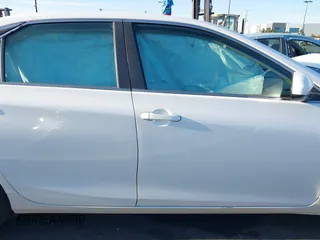 2015 Toyota Camry XLE with VIN 4T1BF1FK9FU923208, listed as a IAAI auction lot 42076970 with 124,096 mi miles and . Bid and sale history available at carsss.com. Image 13.
