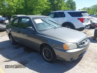 2001 Hyundai Accent GLS z VIN KMHCG35C01U136132, wystawiony jako IAAI lot #42293830 z przebiegiem 111 906 mil mil oraz . Historia ofert i sprzedaży dostępna na DreamBid. Obrazek 1.