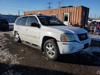 2005 GMC Envoy SLT with VIN 1GKDS13S052231236, listed as a Copart auction lot 45741075 with 116,678 mi miles and Salvage Title. Bid and sale history available at carsss.com. Image 4.