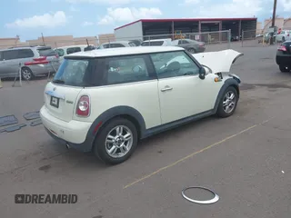 2012 MINI Hardtop with VIN WMWSU3C54CT262450, listed as a IAAI auction lot 42148430 with 55,250 mi miles and . Bid and sale history available at DreamBid. Image 4.