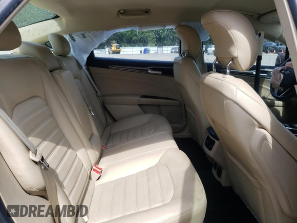 2013 Ford Fusion SE Hybrid z VIN 3FA6P0LU7DR197801, wystawiony jako Copart lot #60468095 z przebiegiem 169 215 mil mil oraz Szkoda całkowita • Salvage title. Historia ofert i sprzedaży dostępna na DreamBid. Obrazek 10.