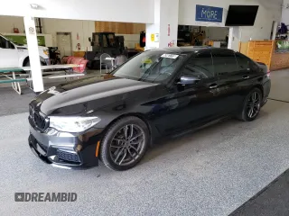 2018 BMW 5 Series 540i xDrive z VIN WBAJE7C59JWC54584, wystawiony jako Copart lot #52461115 z przebiegiem 76 326 mil mil oraz Czysty tytuł • Clean title. Historia ofert i sprzedaży dostępna na DreamBid. Obrazek 1.