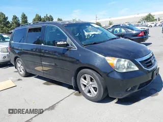 2008 Honda Odyssey Touring with VIN 5FNRL38948B116432, listed as a IAAI auction lot 42162566 with 121,996 mi miles. Bid and sale history available at carsss.com. Image 1.