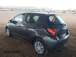 2015 Toyota Yaris L with VIN VNKKTUD36FA032392, listed as a IAAI auction lot 41727506 with 72,261 mi miles and . Bid and sale history available at DreamBid. Image 3.