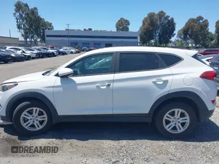 2016 Hyundai Tucson SE z VIN KM8J23A45GU246722, wystawiony jako IAAI lot #41522829 z przebiegiem 123 777 mil mil oraz . Historia ofert i sprzedaży dostępna na DreamBid. Obrazek 13.