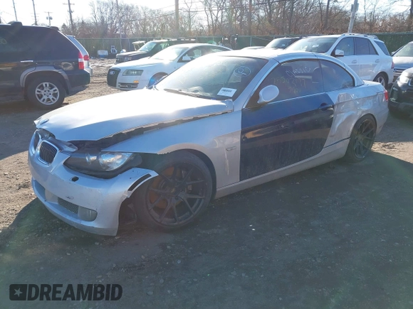 2007 BMW 3 Series 335i with VIN WBAWL73507PX45704, listed as a IAAI auction lot 41752465 with 999,999 mi miles. Bid and sale history available at carsss.com. Image 2.