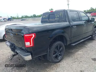 2015 Ford F-150 XLT z VIN 1FTEW1EF0FFA73964, wystawiony jako IAAI lot #42653691 z przebiegiem 129 866 mil mil oraz . Historia ofert i sprzedaży dostępna na DreamBid. Obrazek 4.